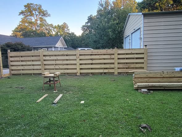 Full-privacy cedar board-on-board panel install in Overland Park, KS — RKC Wood Care Pros