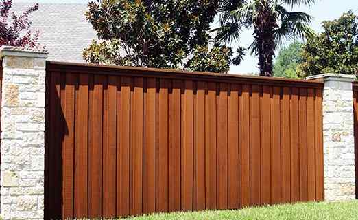 Good-neighbor equal-finish privacy fence install in Overland Park, KS — RKC Wood Care Pros