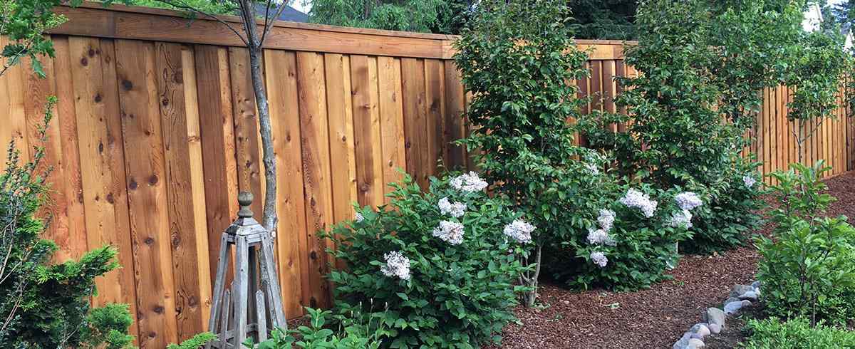 Cedar shadow box cap rail privacy fence FAQ — Overland Park, KS — RKC Wood Care Pros