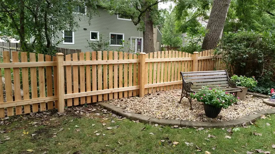Western Red Cedar privacy fence set 36 inches deep in concrete in Grandview, MO — RKC Wood Care Pros