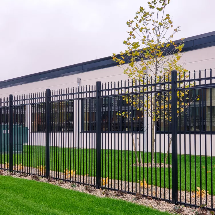 Commercial 6-gauge chain link perimeter with truss-rod bracing in Lenexa, KS — RKC Wood Care Pros