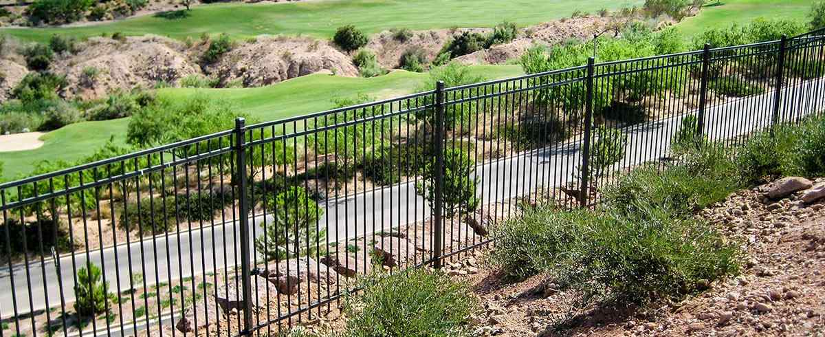Dumpster screening enclosure with property line demarcation in Lenexa, KS — RKC Wood Care Pros