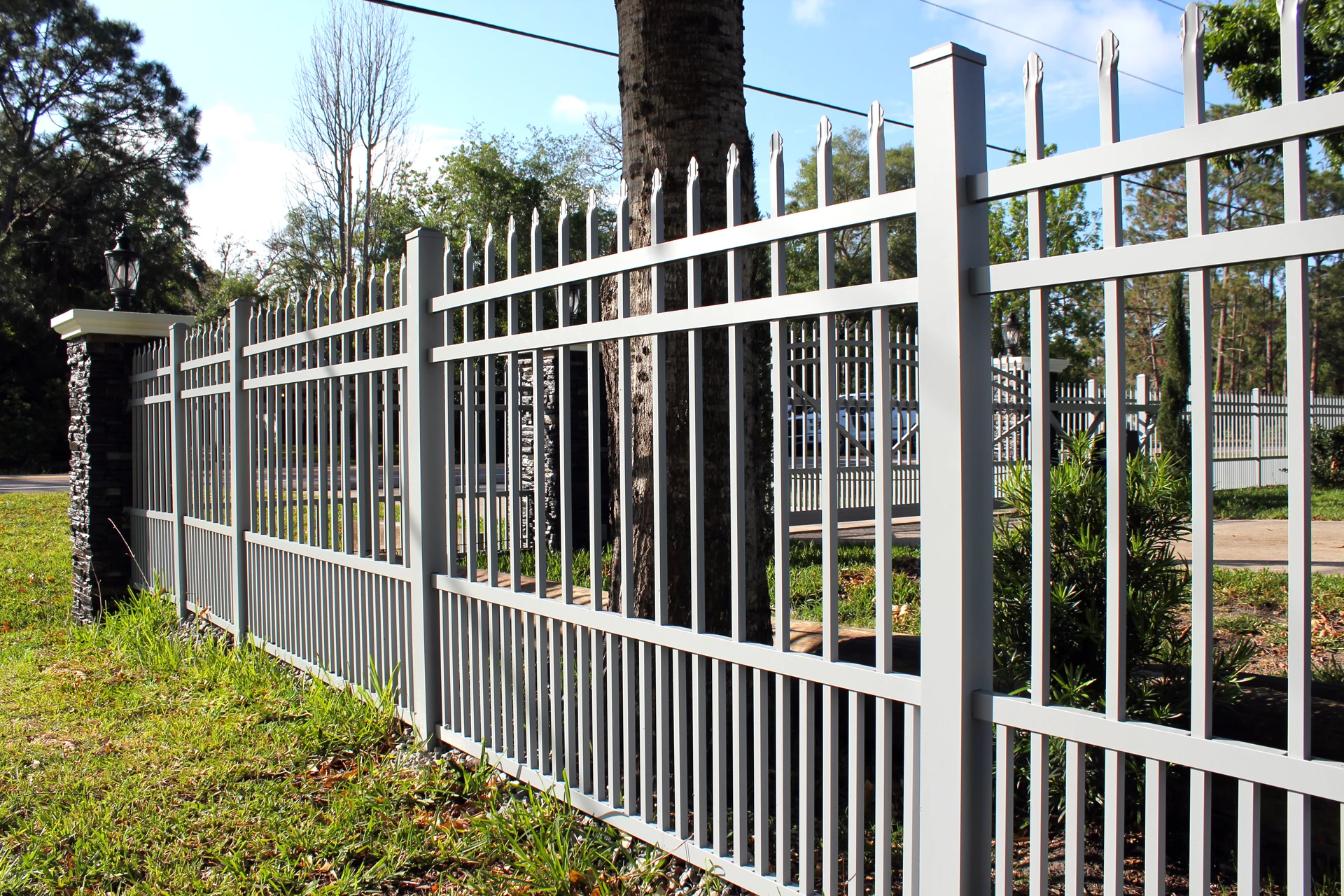 Ornamental iron spear-top fence cost per foot — Peculiar, MO — RKC Wood Care Pros