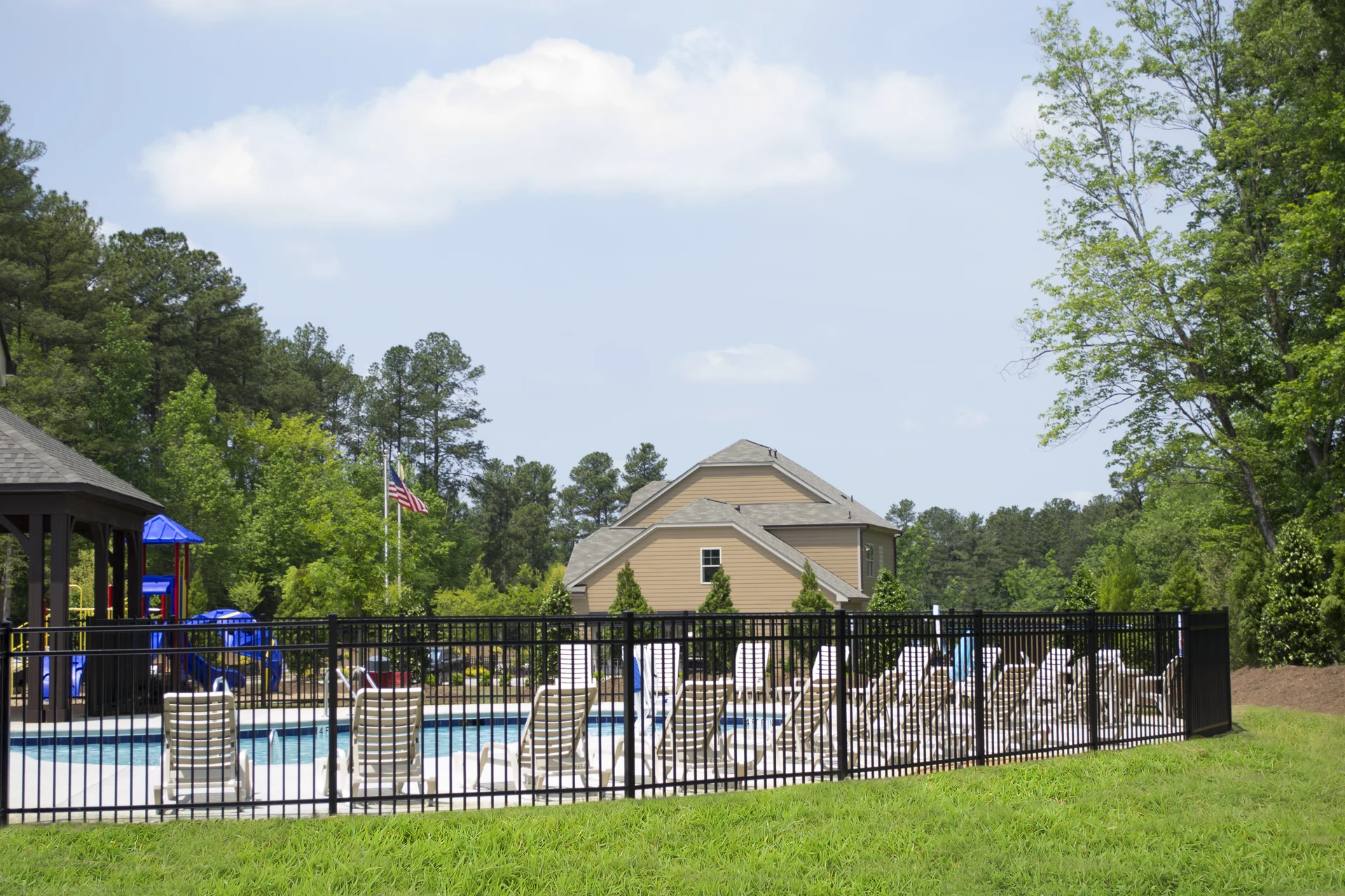 Pool-code aluminum flat-top fence pricing — Raymore, MO — RKC Wood Care Pros
