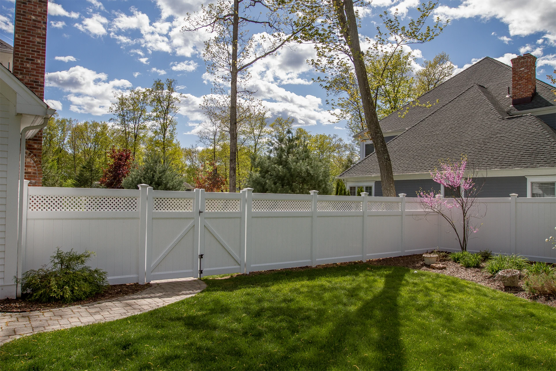 Vinyl Fence Installation project in Overland Park, KS by RKC Wood Care Pros