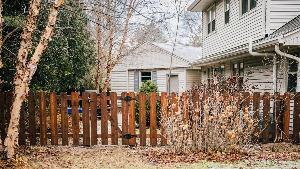 Western Red Cedar privacy fence set 36 inches deep in concrete in Pleasant Hill, MO — RKC Wood Care Pros