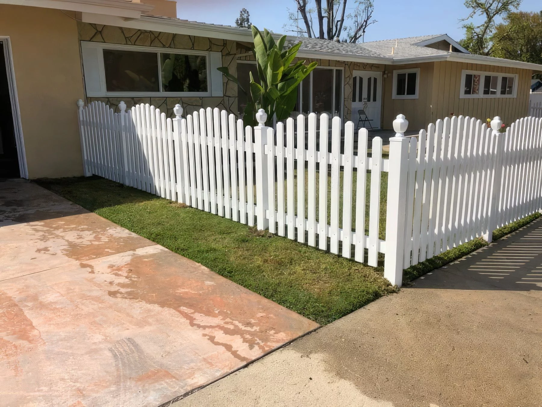 Cedar board-on-board privacy fence with kickboard in Prairie Village, KS — RKC Wood Care Pros