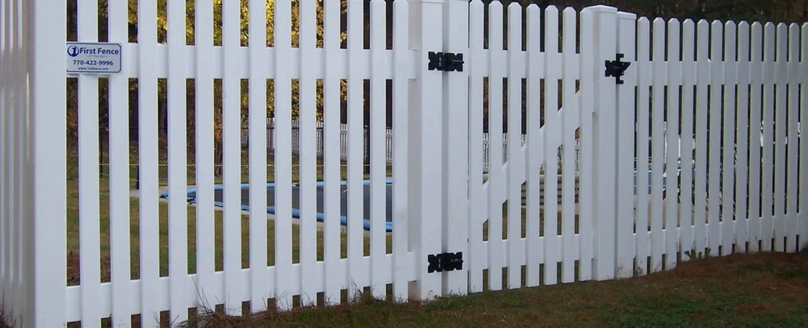 Western Red Cedar privacy fence set 36 inches deep in concrete in Prairie Village, KS — RKC Wood Care Pros