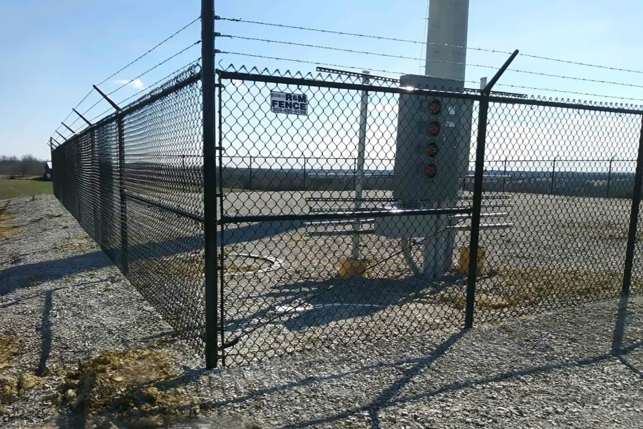 Commercial 6-gauge chain link perimeter with truss-rod bracing in Lee's Summit, MO — RKC Wood Care Pros